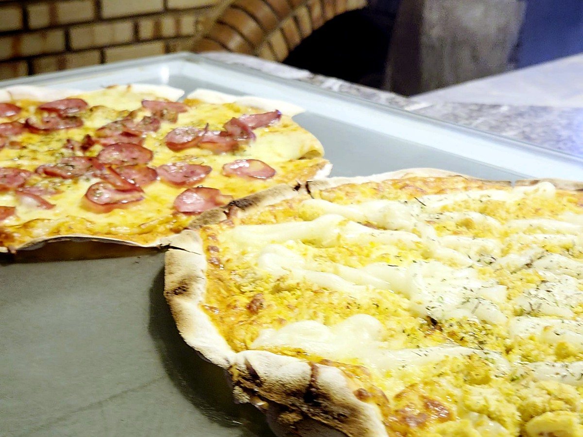 Pizza servida no rodízio